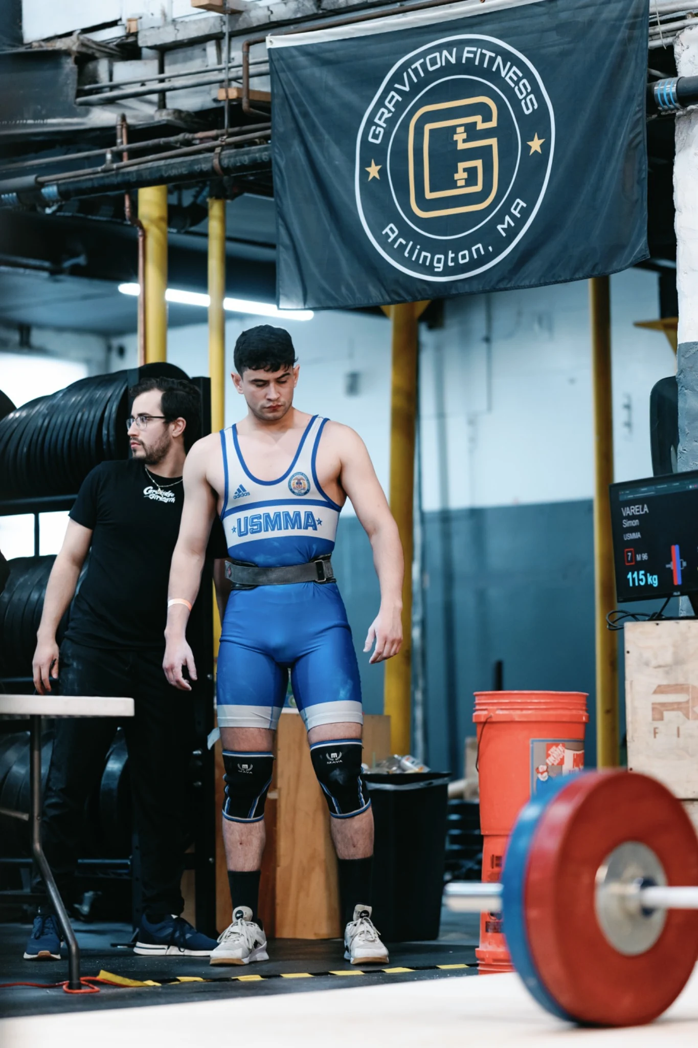 Simon Varela preparing to compete at an Olympic weightlifting meet